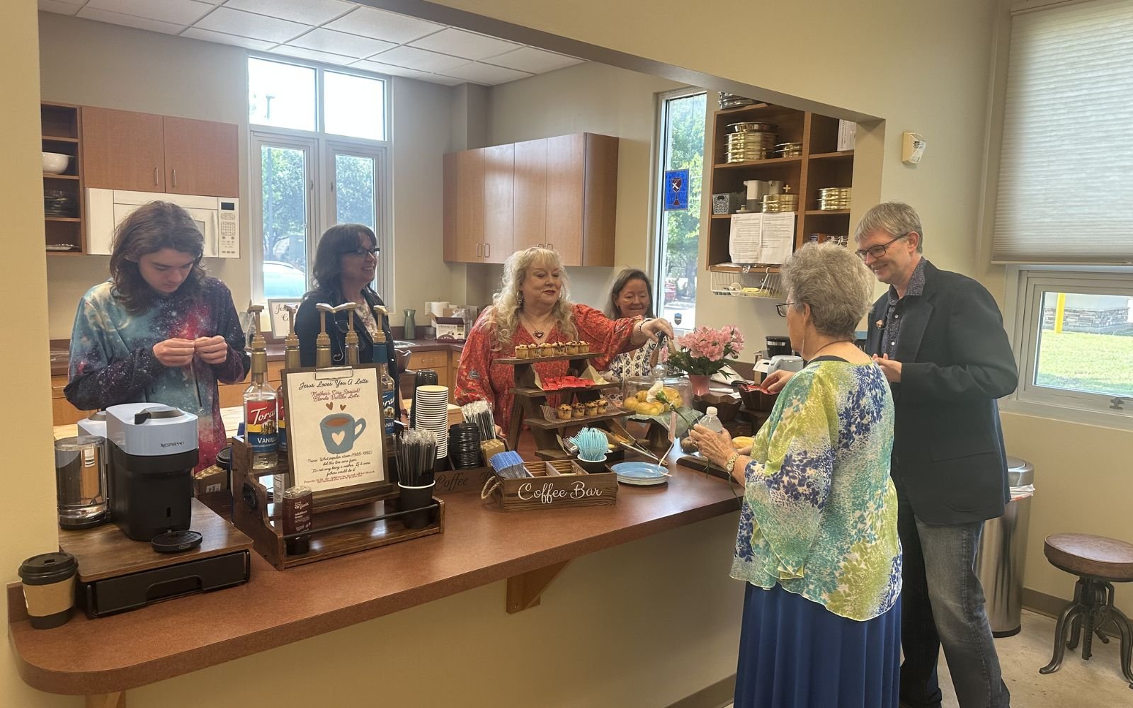 People enjoying coffee and fellowship at First Christian Church Allen